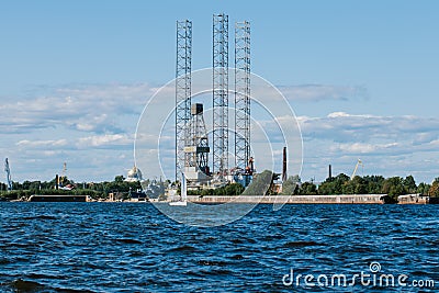 Ensco 101 floating drilling rig,drilling cranes,vessels and mining platforms in Kronstadt on Navy Day.Kronstadt Marine Stock Photo