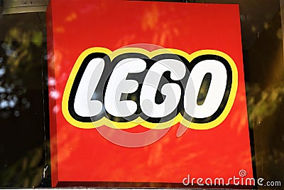 Ensign with the name of the famous brand of construction toys, Lego. Editorial Stock Photo