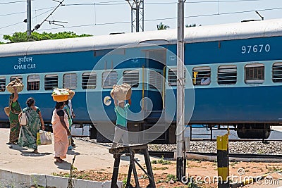 Enterprising Indian traders on the railway Editorial Stock Photo