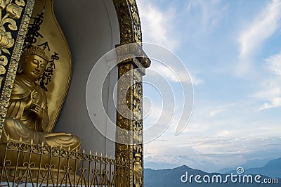 Enthroned Buddha Statue at Shanti Stupa in Pokhara Stock Photo