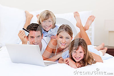 Enthusiastic family buying online Stock Photo