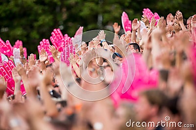 Enthusiastic sports fans clapping hands Editorial Stock Photo