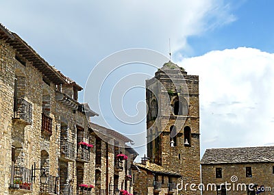 Entral square and medieval church of Ainsa Huesca Stock Photo