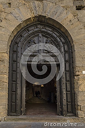 Entrance door of the Palazzo dei Priori in Volterra Stock Photo