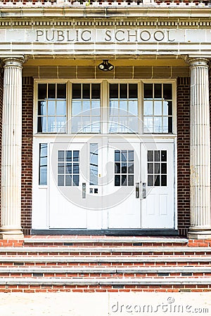 Entrance doors to a typical American school building with steps Stock Photo