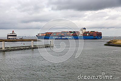 Entrance Dutch canal Terneuzen and cargo ship sailing river Schelde Editorial Stock Photo