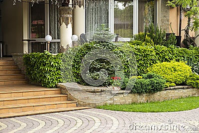 Entrance element to the building with green spaces Stock Photo