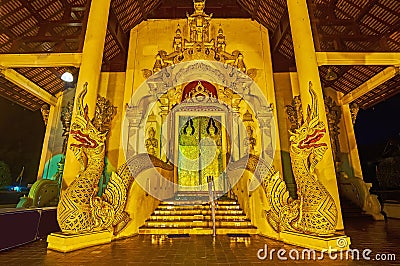 Naga serpents and ornate gate of Phra Viharn Luang of Wat Chedi Luang, Chiang Mai, Thailand Stock Photo