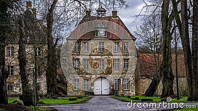 Entrance gate of the Water Castle `Schloss Tatenhausen` in Kreis Guetersloh, North Rhine-Westphalia, Germany Stock Photo