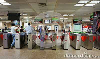Entrance gates at subway station in Singapore Editorial Stock Photo