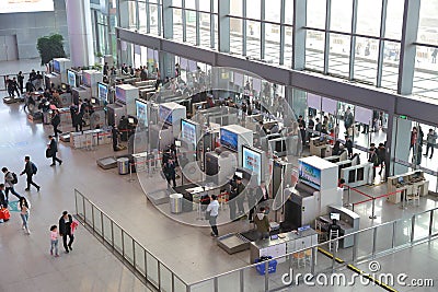 Asian China, The entrance hall of the Shanghai Hongqiao Central Railway Station airport security station and Scan guard checkpoint Editorial Stock Photo