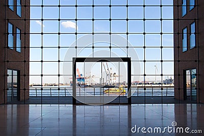 Business building in Hamburg with big windows and a view of the famous harbour Stock Photo