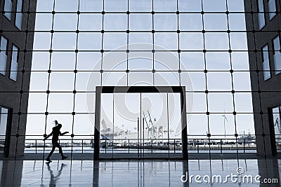 Business building in Hamburg with big windows and a view of the famous harbour Stock Photo