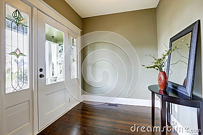 Entrance hallway with small table and mirror Stock Photo