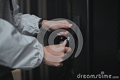 Entrance, hands and worker opening a server room for cyber security, programming and coding. Programmer, business and Stock Photo
