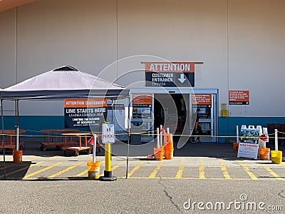 Entrance at The Home Depot during COVID-19 pandemic. Coronavirus virus social distancing. Editorial Stock Photo