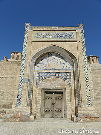 Entrance of an old closed madrasah to Bukhara in Uzbekistan. Editorial Stock Photo