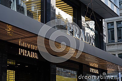 Entrance of Prada boutique in Zurich Switzerland. Italian fashion house is famous for leather handbags, travel accessories. Editorial Stock Photo