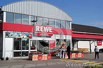 Entrance of a REWE supermarket Editorial Stock Photo