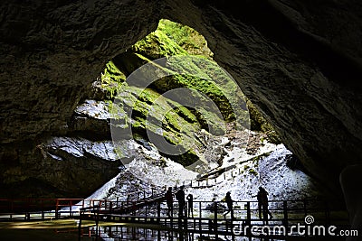 Entrance of Scarisoara cave, Apuseni Mountains, Romania Stock Photo