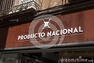 Entrance and sign of Producto Nacional, a local food and beverage store in Segovia, Spain Editorial Stock Photo