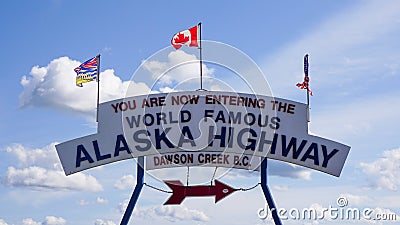 Entrance Sign to the Alaska Highway Editorial Stock Photo
