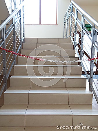 Entrance stairs closed with rope, no entry sign. Stock Photo