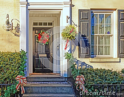historic home in Stockade Historic District decorated for Christmas holiday Stock Photo