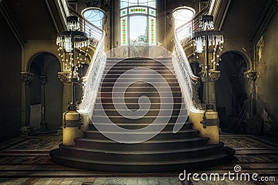 Entrance with symmetrical stairs of an abandoned casino Stock Photo