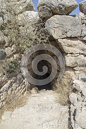 Entrance to cave at Mycenae Stock Photo