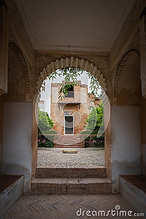 Entrance to Generalife Palace and Court of the Dismount at Generalife Gardens of Alhambra - Granada, Andalusia, Spain Editorial Stock Photo