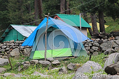 An entrance to a lush green Forest at Malana with Camps, Himachal Pradesh, Stock Photo