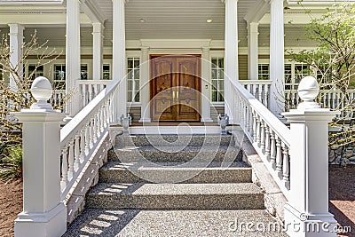 Entrance to a luxury country home with wrap-around deck. Stock Photo