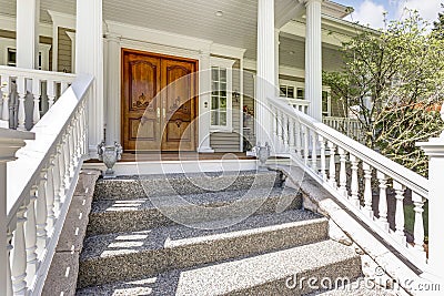 Entrance to a luxury country home with wrap-around deck. Stock Photo