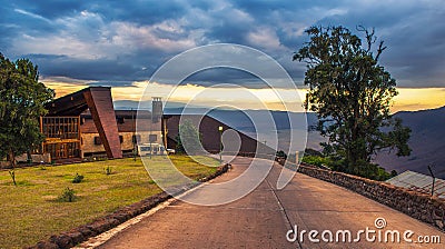 Entrance to the luxury Ngorongoro Wildlife Lodge viewed at sunset Editorial Stock Photo