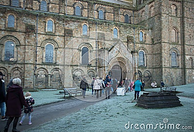 Entrance to medieval stone cathedral with romanesque windows. Exterior facade view. Durham Cathedral World Heritage Site Editorial Stock Photo