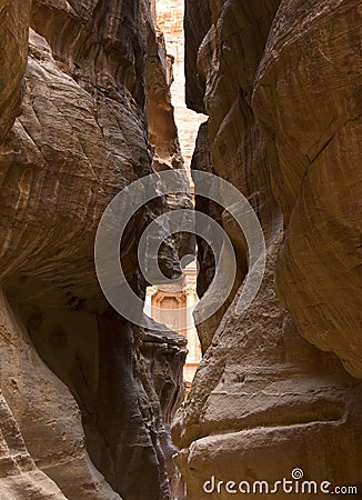 Entrance to the petra monument through a rocky canyon , unesco world heritage site in Jordan Editorial Stock Photo