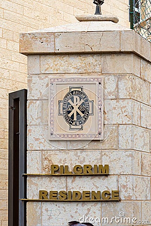 The entrance to the Piligrim Residence building on the Milk Grotto Street near the Church of Nativity in Bethlehem in the Editorial Stock Photo