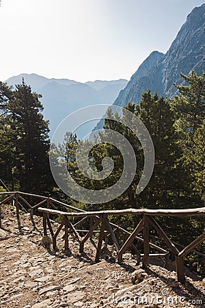 Entrance to Samaria gorge surrounded by very high mountains, south west part of Crete island Stock Photo