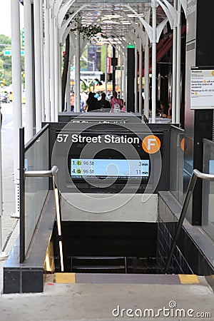 Entrance to the 57th Street subway station of Line F in near Central Park New York City Editorial Stock Photo