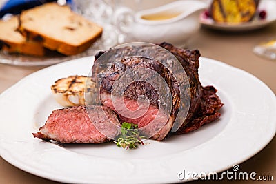 Entrecote with grilled garlic Stock Photo