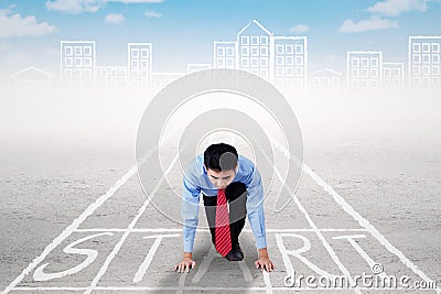 Entrepreneur ready to compete on start line Stock Photo