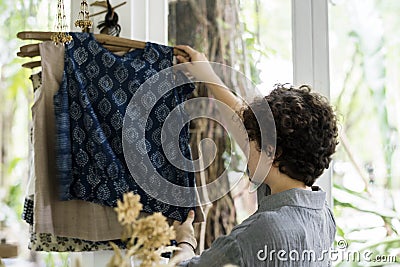 An entrepreneur woman in a clothe shop Stock Photo