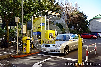 Entry and exit gate bar of toll parking Editorial Stock Photo