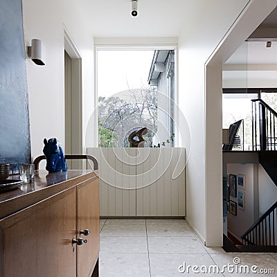 Entry foyer in mid century modern home interior Stock Photo
