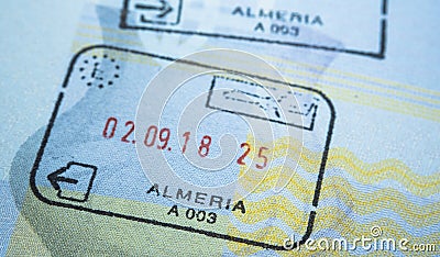 Entry stamp in passport made by immigration officer at border and visa control at Almeira airport in Spain. Selective focus. Macro Stock Photo