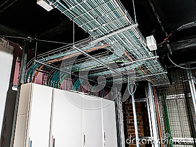 Entry of wiring to electrical panel Stock Photo