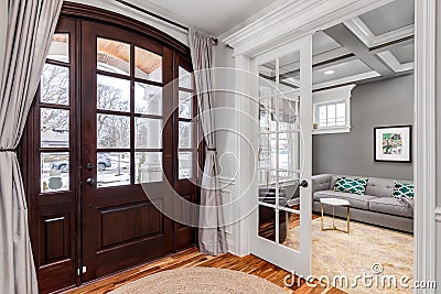 Entryway with large wood door. Editorial Stock Photo