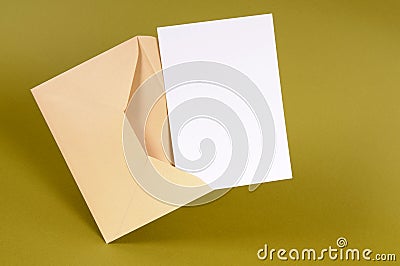 Manila brown envelope with blank letter or note card, copy space Stock Photo