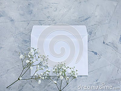 Envelope flower beautiful greeting on concrete backgroundn floral invitation Stock Photo